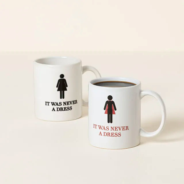 "IT WAS NEVER A DRESS" MUG